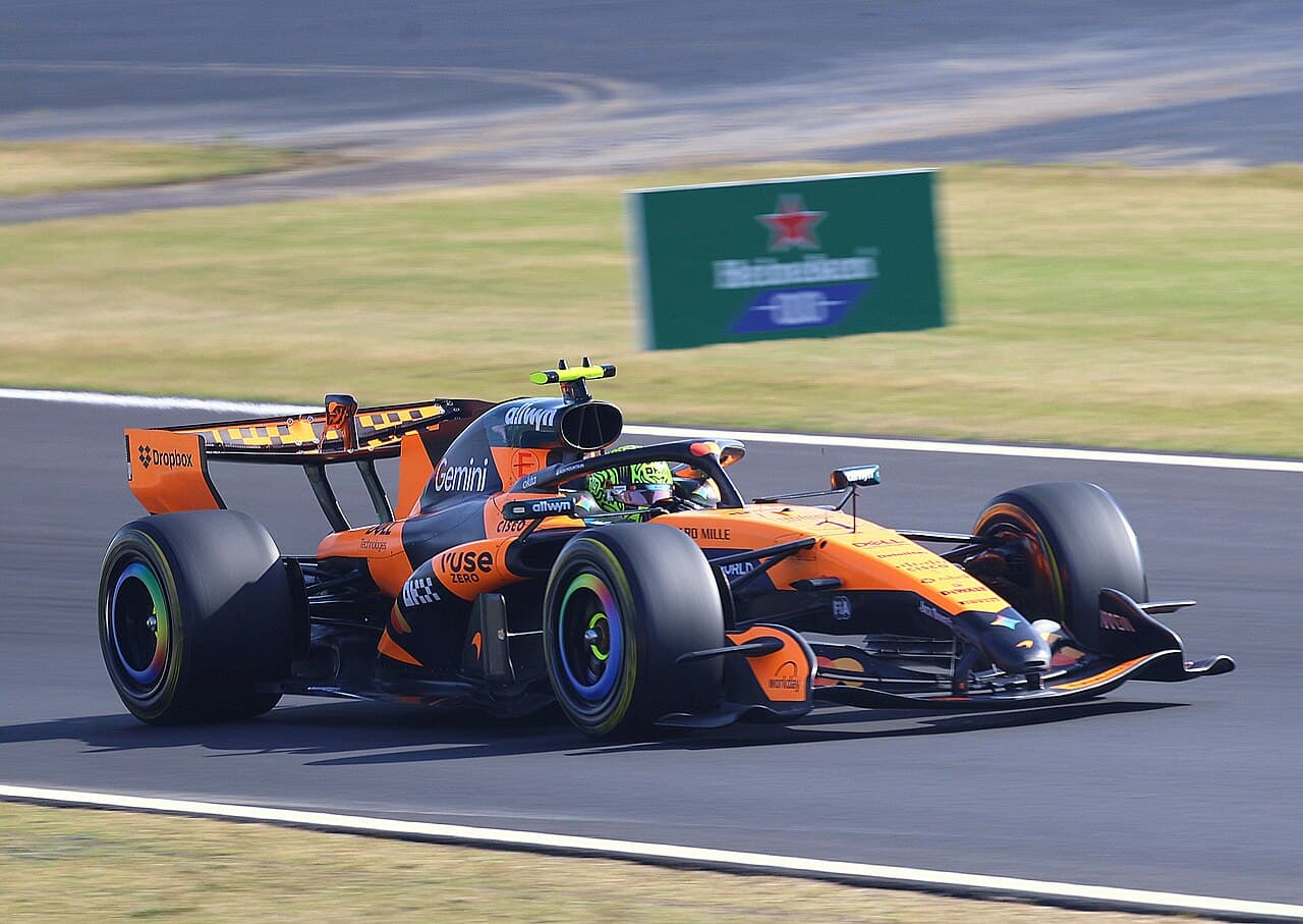 Lando Norris driving the McLaren MCL40 through Spoon Curve at the 2026 Japanese Grand Prix