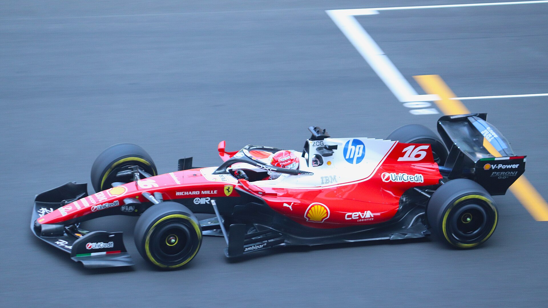 Charles Leclerc driving the red and white Ferrari SF-26 during practice at the 2026 Chinese Grand Prix